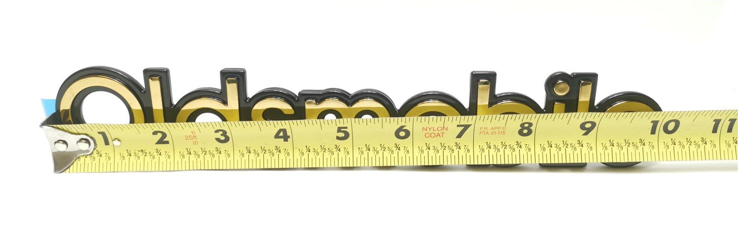 One Gold Black Oldsmobile Door Emblem GM 15957900