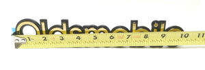 One Gold Black Oldsmobile Door Emblem GM 15957900