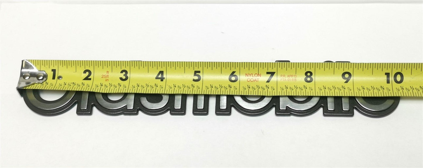 One Silver Black Oldsmobile Door Emblem Name Plate GM 15679071